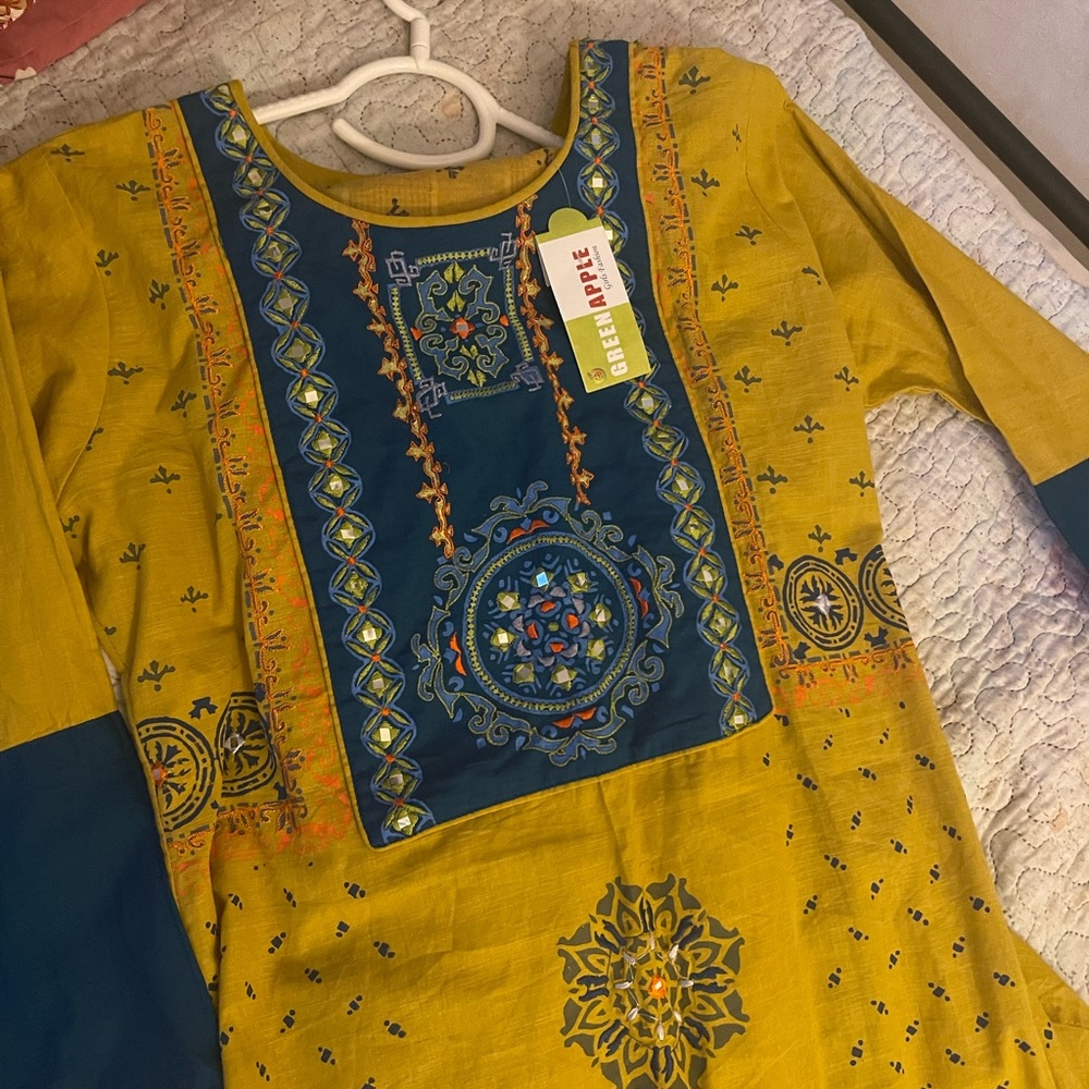 Beautiful brand new Indian dress with color contrast.